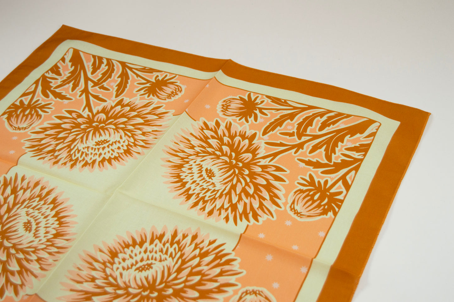 a piece of cloth with a flower design on it