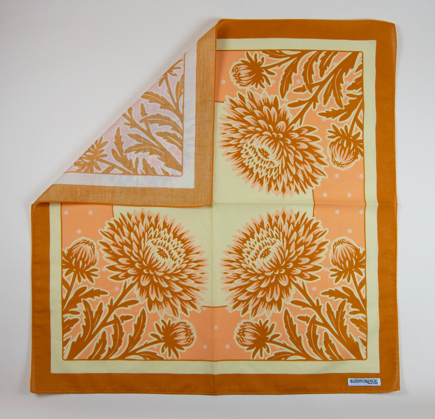 a piece of cloth with a flower design on it